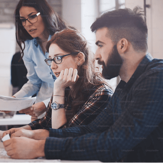 happy-creative-coworkers-working-in-designer-office-B9MZmxL9AO8